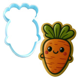 a cookie cutter and a cookie shaped like a carrot