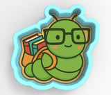 A green caterpillar wearing glasses and carrying a backpack full of books.