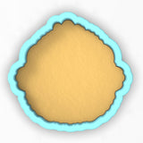 a round cookie tin with a blue border around it