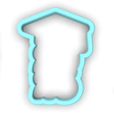 a cookie cutter shaped like a house