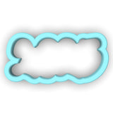 a cookie cutter shaped like a cloud