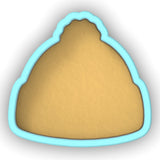 a cookie shaped cookie cutter with a cookie in the shape of a hat