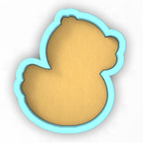 a cookie shaped like a teddy bear on a white background