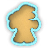 a cookie shaped like a teddy bear on a white background