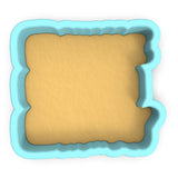 a cookie cutter with a cookie in the shape of a square