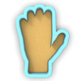 a paper cut out of a hand with a blue outline