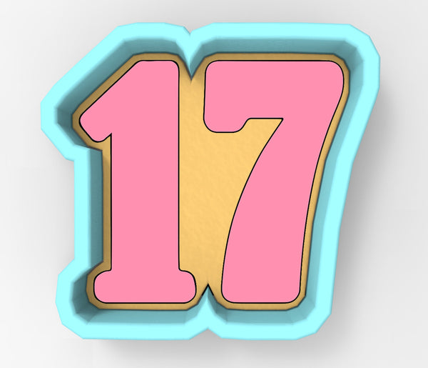 A 3D rendering of the number 17 in pink and blue colors.