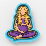 A cartoon illustration of a pregnant woman sitting cross-legged with a baby on her lap.