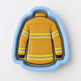 A cookie cutter in the shape of a fireman's uniform, with yellow and gray stripes.