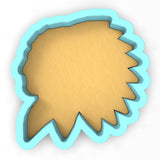 a cookie cutter with a cookie shaped like a head