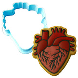 a cookie cutter shaped like a human heart