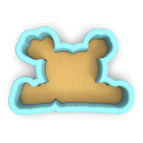 a cookie shaped like a teddy bear on a white background