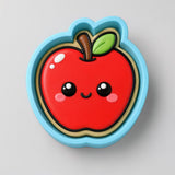 A red apple with a smiling face and a stem is depicted in the image.