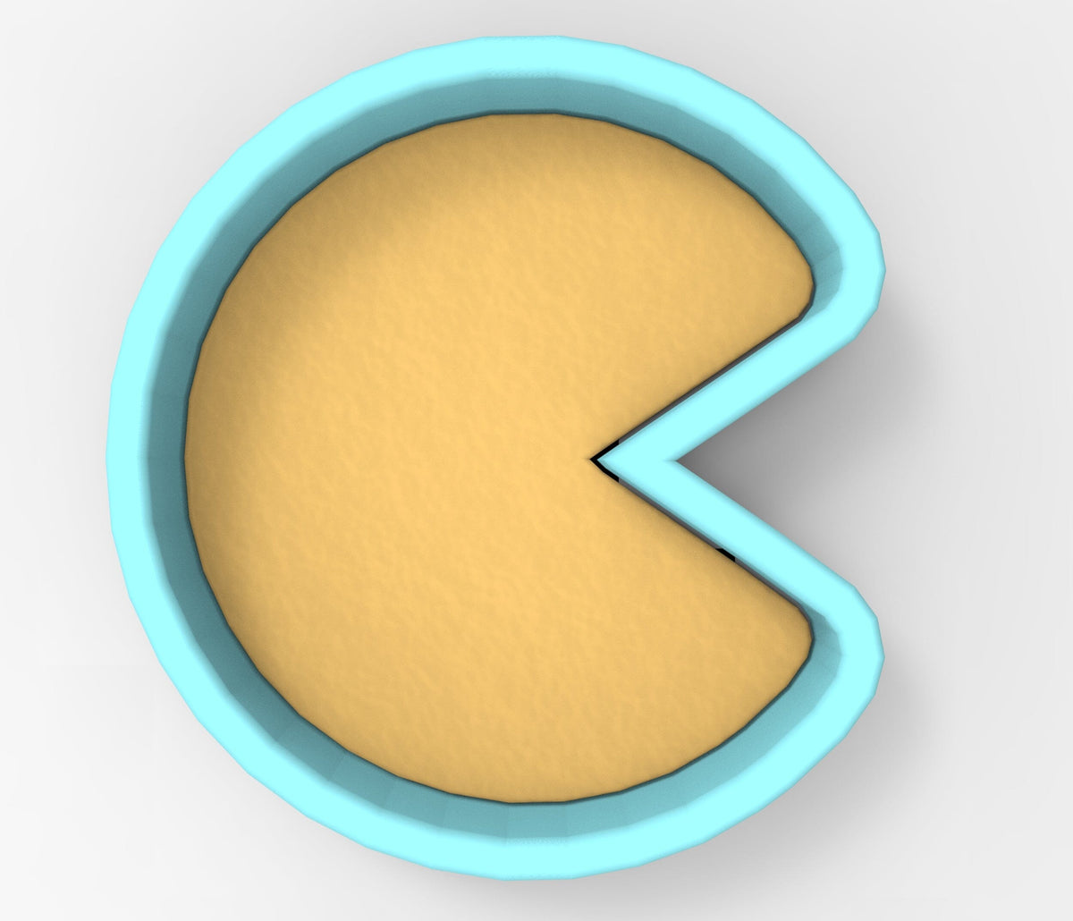 A blue bowl with a slice cut out of it, containing a yellow substance.