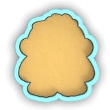 a cookie shaped like a tree on a white background