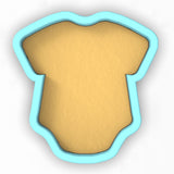 a cookie cutter with a picture of a shirt on it