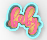 A cookie cutter in the shape of the word "baby" in pink cursive script.