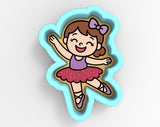 A cartoon image of a young girl wearing a pink tutu and ballet slippers, with a bow in her hair, smiling and dancing.