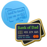 a blue and a black credit card are next to each other