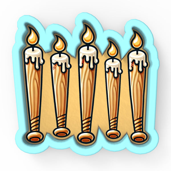 a group of candles that are on a sticker