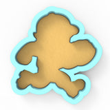 a cookie cutter shaped like a teddy bear