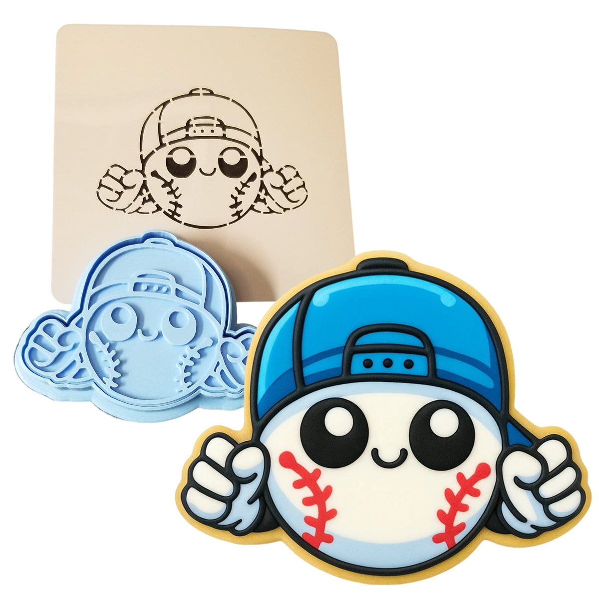 a cookie with a baseball cap on it and a cookie cutter next to it