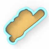 a cookie cutter with a cookie inside of it