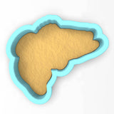 a cookie cutter shaped like a map of africa