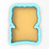 a cookie cutter shaped like a piece of bread