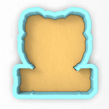 a paper cut out of a teddy bear