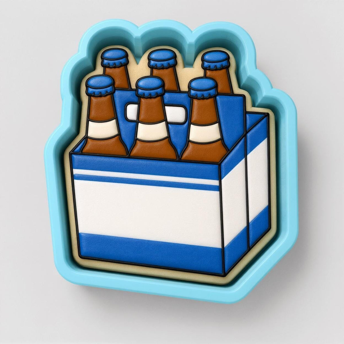 A blue and white cookie cutter shaped like a six-pack of beer bottles.