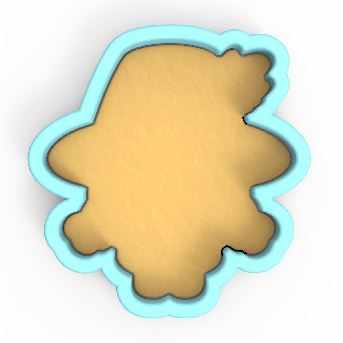 a cookie cutter with a cookie in the shape of a bear