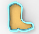 A 3D rendering of a blue boot-shaped cookie cutter.