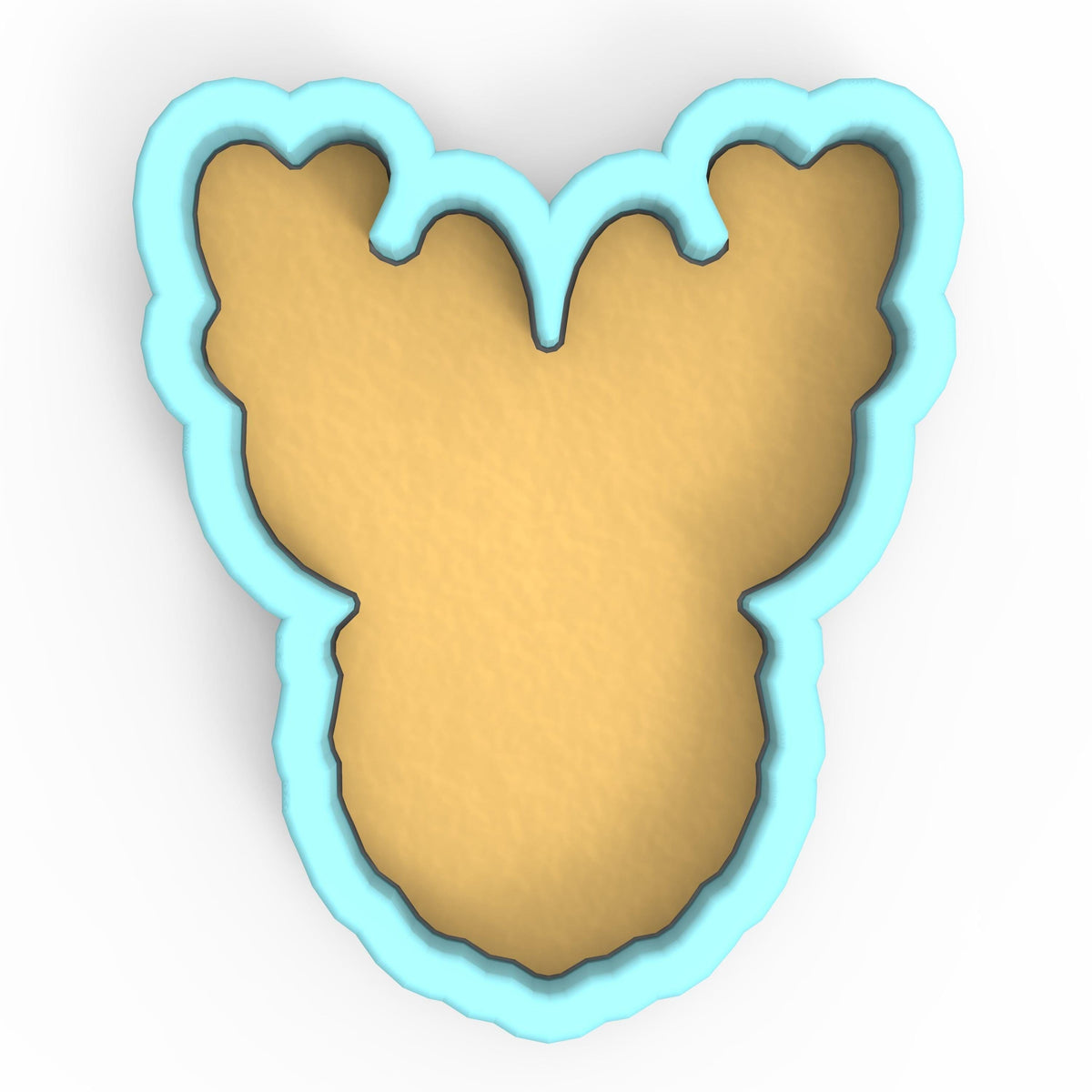 a cookie cutter shaped like a bear's head