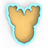 a cookie cutter shaped like a bear's head