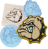 a set of three cookie cutters with different designs