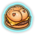 a drawing of a heart shaped sandwich on a plate