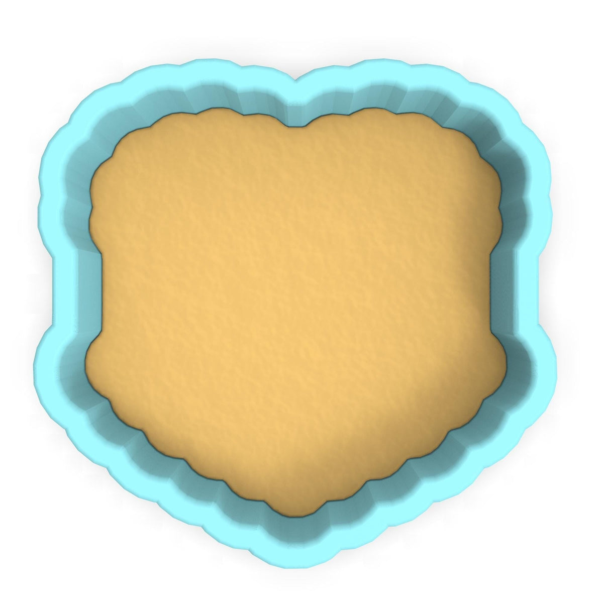 a cookie cutter with a cookie in the shape of a heart