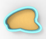 A blue-bordered cookie cutter with a yellow-colored interior, likely used for cutting cookies or other dough-based items.