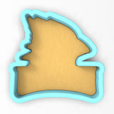 a cookie cutter shaped like the shape of a map