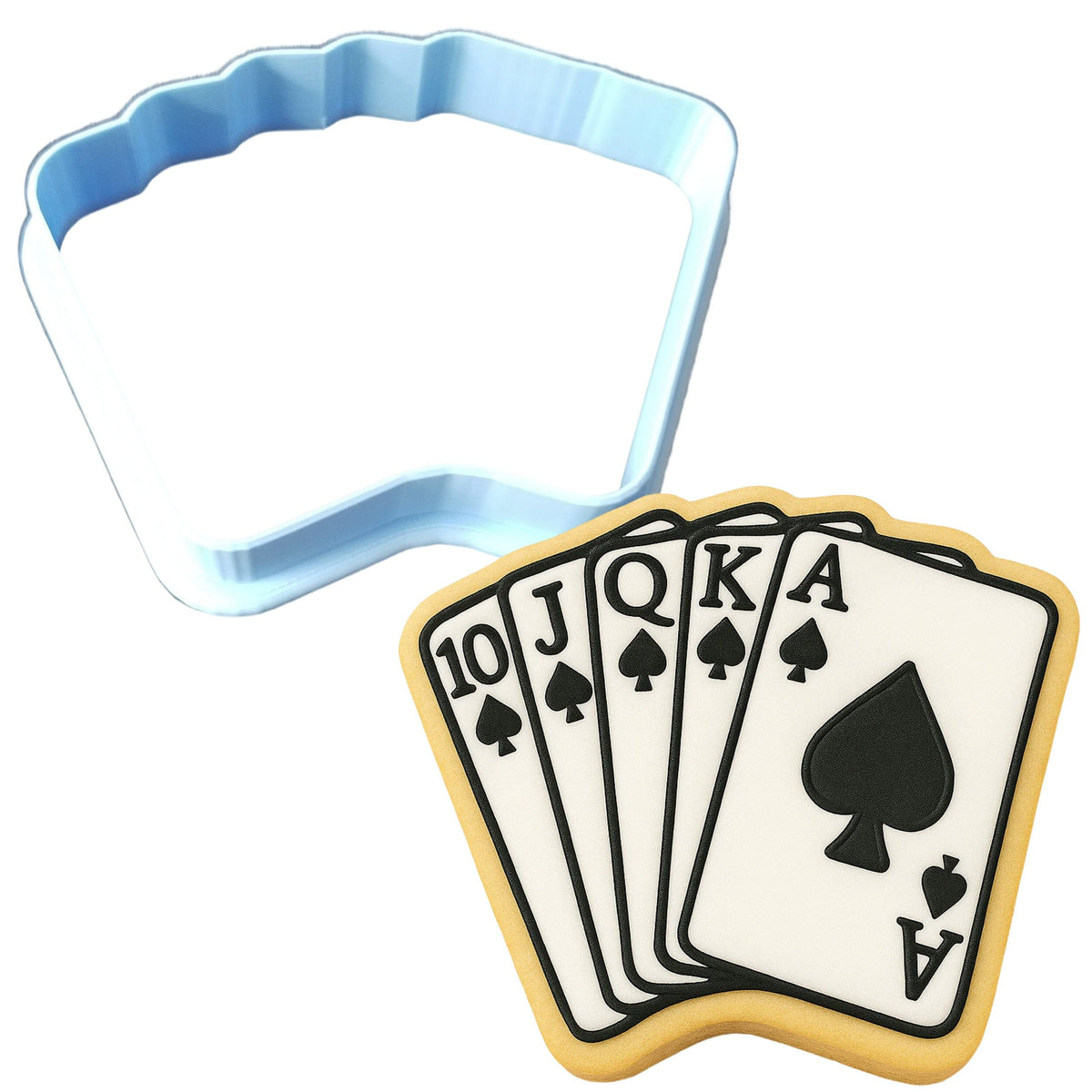 a cookie shaped like a playing card and a cookie cutter