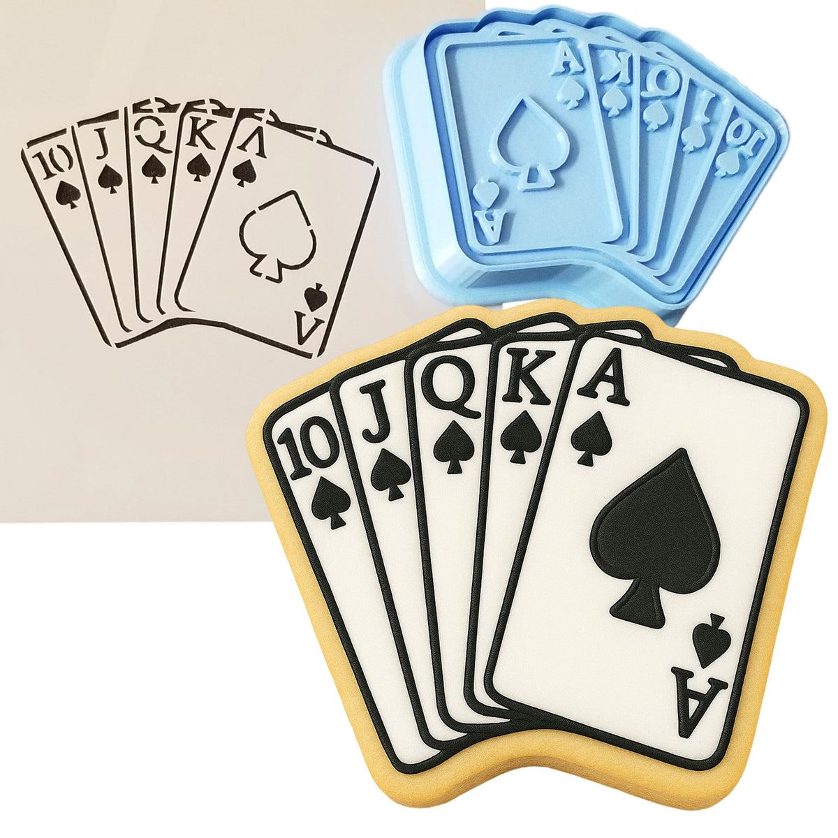 a cookie with playing cards and a cookie cutter