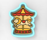 a picture of a carousel with a dog on it