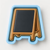 A wooden chalkboard with a blackboard surface, placed inside a blue, wooden-framed container.