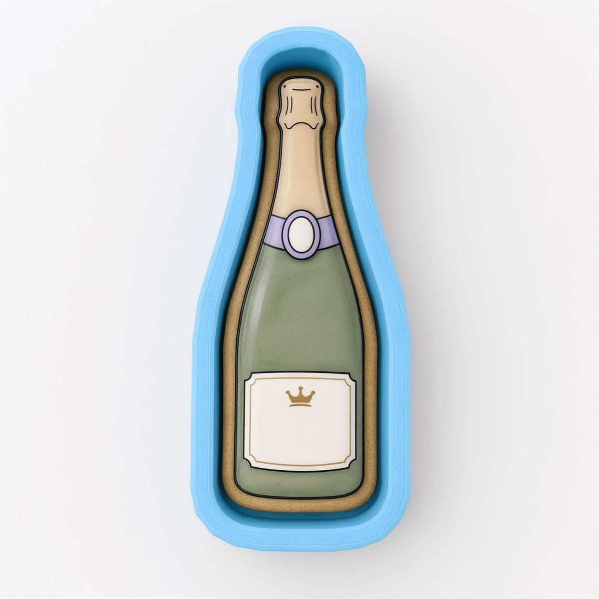 A blue mold or cookie cutter shaped like a champagne bottle with a label.