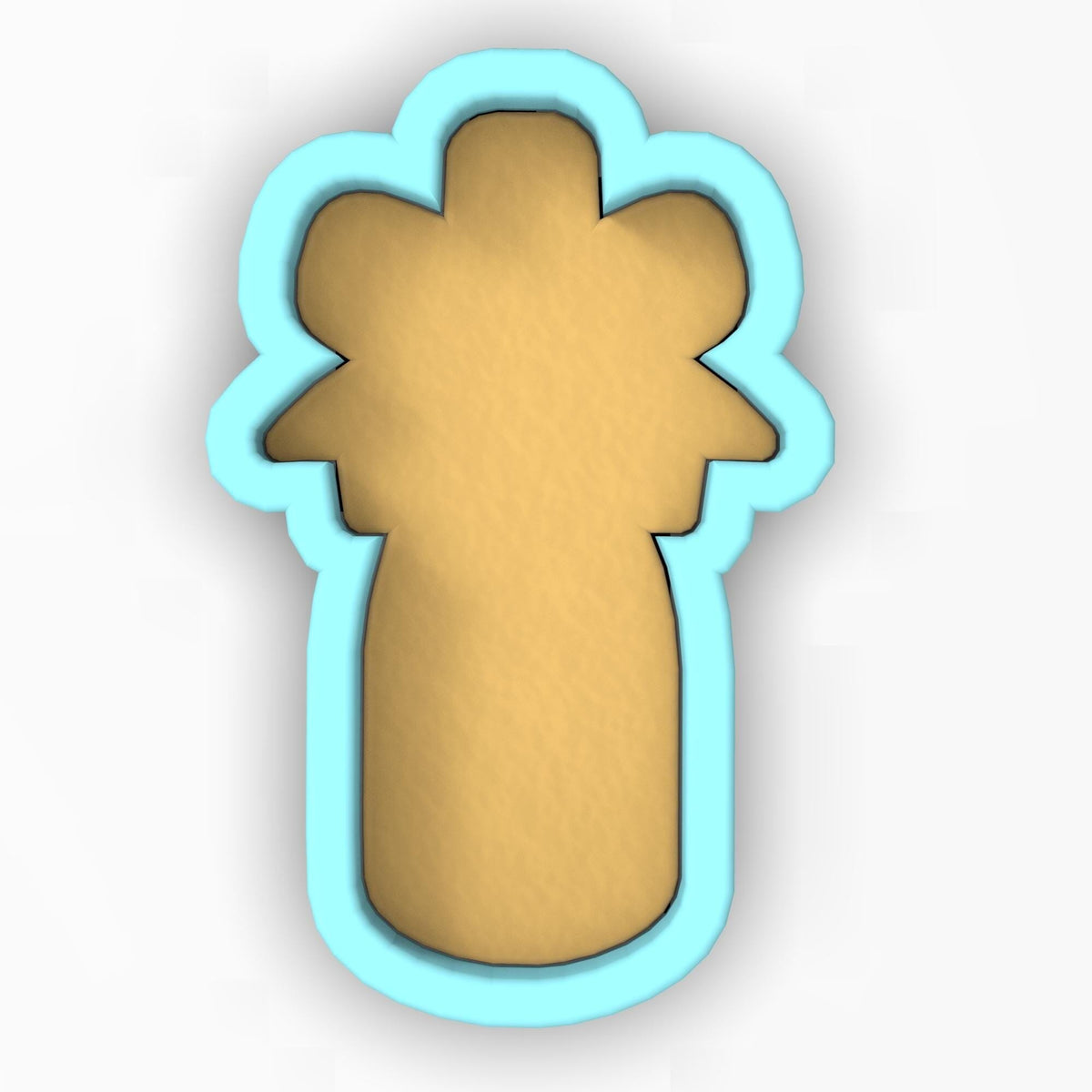 a cookie shaped like a cross on a white background