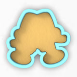 a cookie cutter shaped like a teddy bear