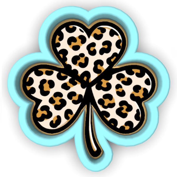 a four leaf clover with leopard print on it