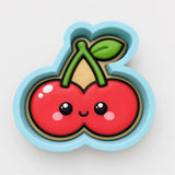 A cute, cartoon-style cherry with a smiling face and a leaf on top, set against a light blue background.