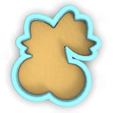 a cookie shaped like a dog with a tail